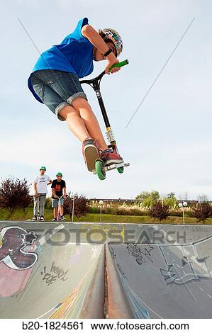 Teenager with city scooter in Skate park, Leioa, Bizkaia, Basque Country, Spain View Large Photo Image Stock Image - Teenager with city scooter in Skate park, Leioa, Bizkaia, Basque Country, Spain. Fotosearch