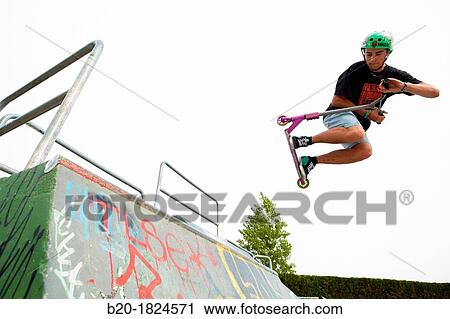 Teenager with city scooter in Skate park, Leioa, Bizkaia, Basque Country, Spain View Large Photo Image Stock Image - Teenager with city scooter in Skate park, Leioa, Bizkaia, Basque Country, Spain. Fotosearch