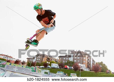 Teenager with city scooter in Skate park, Leioa, Bizkaia, Basque Country, Spain View Large Photo Image Stock Photography - Teenager with city scooter in Skate park, Leioa, Bizkaia, Basque Country, Spain. Fotosearch
