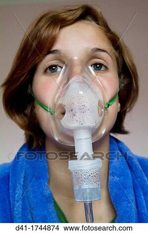 teenager with nebuliser View Large Photo Image Picture - teenager with nebuliser. Fotosearch