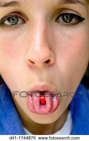 teenager with red tablet medicine View Large Photo Image Stock Photography - teenager with red tablet medicine. Fotosearch