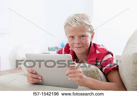 Teenager with Tablet View Large Photo Image Stock Photograph - Teenager with Tablet. Fotosearch