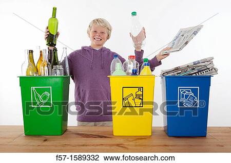Teenager with three arms recycling domestic waste View Large Photo Image Stock Image - Teenager with three arms recycling domestic waste. Fotosearch