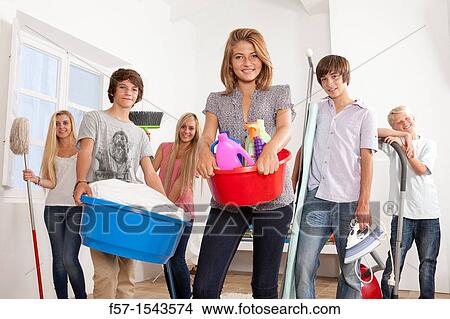 Teenagers doing housework View Large Photo Image Picture - Teenagers doing housework. Fotosearch