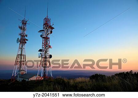 Telecommunication aerials at sunset. View Large Photo Image Stock Image - Telecommunication aerials at sunset.. Fotosearch