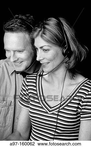 Telemarketing: man and woman View Large Photo Image Stock Image - Telemarketing: man and woman. Fotosearch