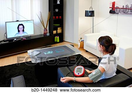 Telemedicine, taking blood pressure in home, Health and Biomedical applications, Vicomtech-IK4 Visual Interaction and Communication Technologies Centre View Large Photo Image Stock Photo - Telemedicine, taking blood pressure in home, Health and Biomedical applications, Vicomtech-IK4 Visual Interaction and Communication Technologies Centre. Fotosearch