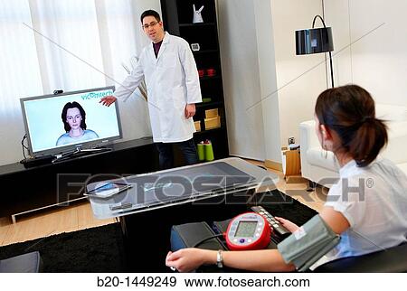 Telemedicine, taking blood pressure in home, Health and Biomedical applications, Vicomtech-IK4 Visual Interaction and Communication Technologies Centre View Large Photo Image Stock Photo - Telemedicine, taking blood pressure in home, Health and Biomedical applications, Vicomtech-IK4 Visual Interaction and Communication Technologies Centre. Fotosearch