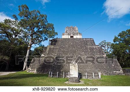 Stock Image - Temple II also known as Temple of the Mask, Great Plaza, Tikal, El Peten department, Guatemala. Fotosearch