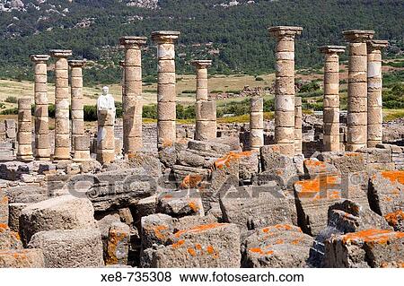 Stock Photo - Temple of Augustus, ruins of old roman city of Baelo Claudia, Tarifa. Cadiz province, Andalucia, Spain. Fotosearch