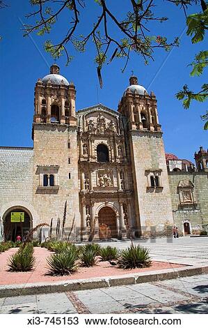 Stock Image - Templo de Santo Domingo, and Museo de las Culturas de Oaxaca, Calle Macedonio Alcala, Oaxaca, Oaxaca State, Mexico. Fotosearch