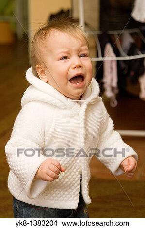 Picture - Ten Month Old Baby Girl Crying. Fotosearch