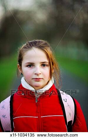 Ten year old girl, looking straight ahead, UK View Large Photo Image Stock Photography - Ten year old girl, looking straight ahead, UK. Fotosearch