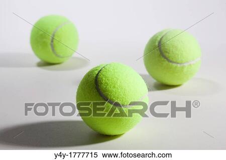 Stock Photography - Tennis balls on white background. Fotosearch