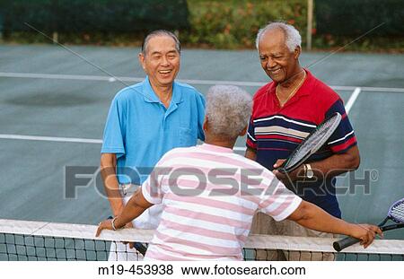 tennis friends talking View Large Photo Image Stock Photo - tennis friends talking. Fotosearch