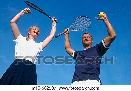 tennis partners celebrating victory View Large Photo Image Stock Photo - tennis partners celebrating victory. Fotosearch