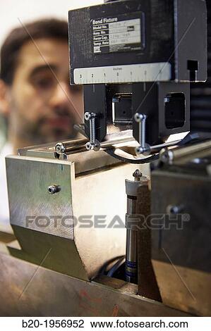 Stock Image - Tensile test and flexion. Carbon fiber sample. Mechanical Testing Laboratory. Technological Services to Industry. Tecnalia Research & Innovation, Donostia, San Sebastian, Gipuzkoa, Basque Country, Spain.. Fotosearch