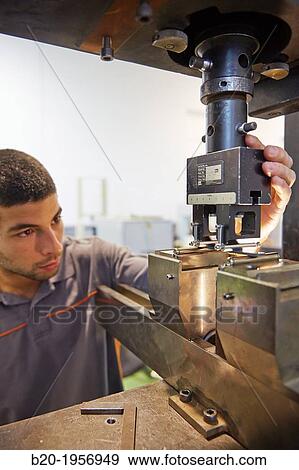 Stock Photo - Tensile test and flexion. Carbon fiber sample. Mechanical Testing Laboratory. Technological Services to Industry. Tecnalia Research & Innovation, Donostia, San Sebastian, Gipuzkoa, Basque Country, Spain.. Fotosearch