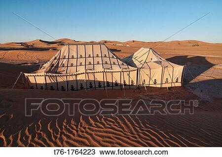 Stock Image - tents at a luxury desert camp in the Sahara at Erg Chigaga, Morocco. Fotosearch