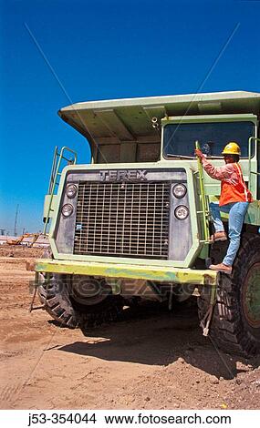 Terex dump truck drivers. I-880 Cypress project. Oakland, California. USA. View Large Photo Image Picture - Terex dump truck drivers. I-880 Cypress project. Oakland, California. USA.. Fotosearch