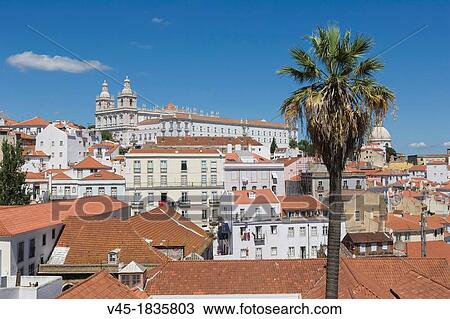 Terrace Portas do Sol, Gates to the Sun, Largo das Portas do Sol, overlooking the Alfama rooftops with The Church, Monastery of Sao Vicente de Fora, Mosteiro, Igreja de Sao Vicente de for a and river Tagus, Lisboa, Lisbon, Portugal. View Large Photo Image Stock Image - Terrace Portas do Sol, Gates to the Sun, Largo das Portas do Sol, overlooking the Alfama rooftops with The Church, Monastery of Sao Vicente de Fora, Mosteiro, Igreja de Sao Vicente de for a and river Tagus, Lisboa, Lisbon, Portugal.. Fotosearch