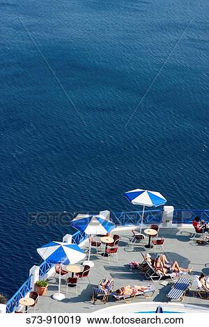 Terrace with views on the sea, Santorini, Cyclades Islands, Greece, View Large Photo Image Stock Photo - Terrace with views on the sea, Santorini, Cyclades Islands, Greece,. Fotosearch