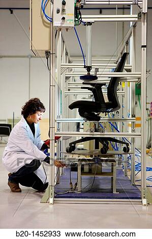 Stock Image - Test on office chair, homologation of furniture, Technology Research Center, Tecnalia Construction, CIDEMCO-Tecnalia Research & Innovation, development of new products and innovative solutions through research and innovation in different fields. Fotosearch