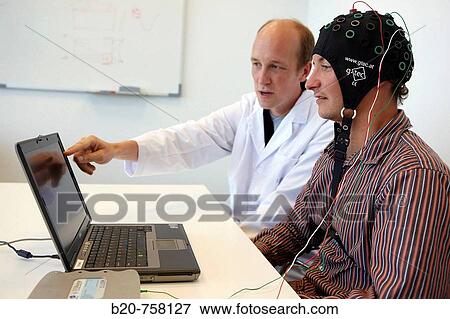 Testing a BCI (Brain-Computer Interface) developed by Health and Quality of life Unit researchers, FIK technology research program for aged and disabled people. Fatronik-Tecnalia, Research and Technology Center, Donostia, Basque Country, Spain View Large Photo Image Stock Photo - Testing a BCI (Brain-Computer Interface) developed by Health and Quality of life Unit researchers, FIK technology research program for aged and disabled people. Fatronik-Tecnalia, Research and Technology Center, Donostia, Basque Country, Spain. Fotosearch