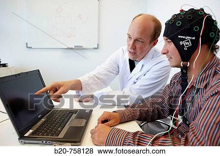 Testing a BCI (Brain-Computer Interface) developed by Health and Quality of life Unit researchers, FIK technology research program for aged and disabled people. Fatronik-Tecnalia, Research and Technology Center, Donostia, Basque Country, Spain View Large Photo Image Stock Photo - Testing a BCI (Brain-Computer Interface) developed by Health and Quality of life Unit researchers, FIK technology research program for aged and disabled people. Fatronik-Tecnalia, Research and Technology Center, Donostia, Basque Country, Spain. Fotosearch