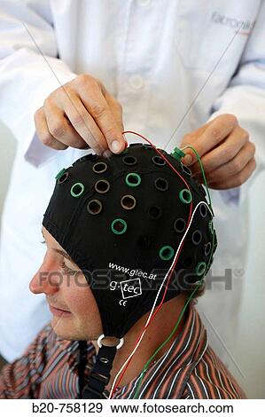 Testing a BCI (Brain-Computer Interface) developed by Health and Quality of life Unit researchers, FIK technology research program for aged and disabled people. Fatronik-Tecnalia, Research and Technology Center, Donostia, Basque Country, Spain View Large Photo Image Stock Photo - Testing a BCI (Brain-Computer Interface) developed by Health and Quality of life Unit researchers, FIK technology research program for aged and disabled people. Fatronik-Tecnalia, Research and Technology Center, Donostia, Basque Country, Spain. Fotosearch