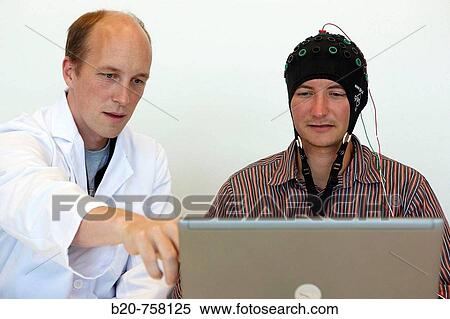 Testing a BCI (Brain-Computer Interface) developed by Health and Quality of life Unit researchers, FIK technology research program for aged and disabled people. Fatronik-Tecnalia, Research and Technology Center, Donostia, Basque Country, Spain View Large Photo Image Stock Photography - Testing a BCI (Brain-Computer Interface) developed by Health and Quality of life Unit researchers, FIK technology research program for aged and disabled people. Fatronik-Tecnalia, Research and Technology Center, Donostia, Basque Country, Spain. Fotosearch