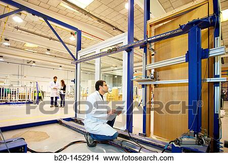 Picture - Testing a door opening/closing cycle, material homologation, Technology Research Center, Tecnalia Construction, CIDEMCO-Tecnalia Research & Innovation, development of new products and innovative solutions through research and innovation. Fotosearch