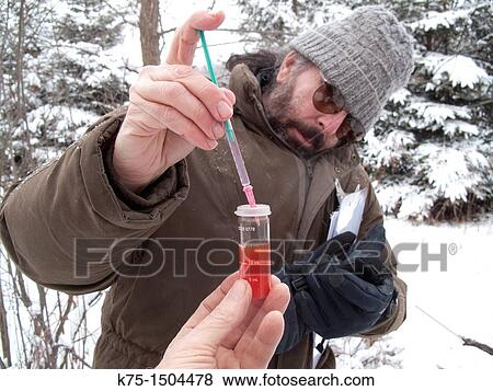 Testing for water pollution View Large Photo Image Stock Photo - Testing for water pollution. Fotosearch
