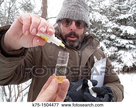 Testing water for pollution View Large Photo Image Stock Photo - Testing water for pollution. Fotosearch