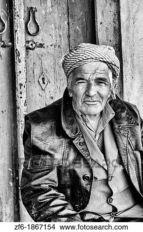 Testour in Tunisia Africa portrait of old Muslim man in native dress and turban View Large Photo Image Picture - Testour in Tunisia Africa portrait of old Muslim man in native dress and turban. Fotosearch