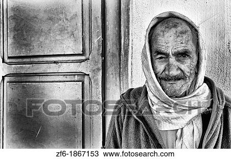 Testour in Tunisia Africa portrait of old Muslim man in native dress and turban View Large Photo Image Stock Image - Testour in Tunisia Africa portrait of old Muslim man in native dress and turban. Fotosearch