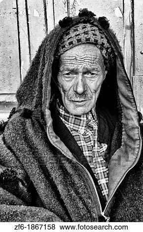 Stock Photo - Testour in Tunisia Africa portrait of old Muslim man in native dress. Fotosearch