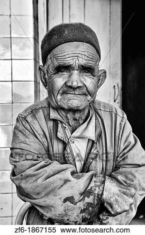 Testour in Tunisia Africa portrait of old Muslim midget man in native dress View Large Photo Image Stock Photography - Testour in Tunisia Africa portrait of old Muslim midget man in native dress. Fotosearch