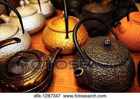 Stock Photo - Teteras chinas de hierro fundido en centro comercial, Barcelona, Catalunya, Espaa. Fotosearch
