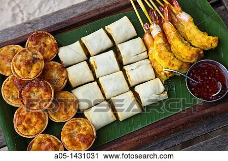 Thai finger food, Hotel Rayavadee, Hat Phra Nang, Krabi, Thailand View Large Photo Image Stock Image - Thai finger food, Hotel Rayavadee, Hat Phra Nang, Krabi, Thailand. Fotosearch