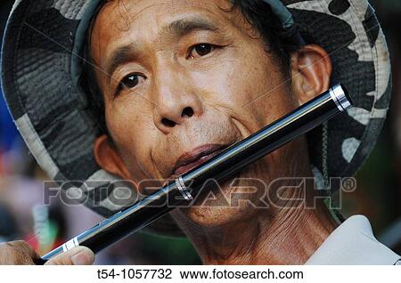 Thai plays a Pipe View Large Photo Image Stock Image - Thai plays a Pipe. Fotosearch