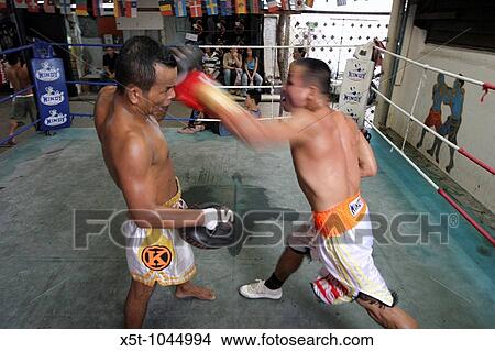 Thailand, Bangkok, a Thai boxing, kick boxing tournament View Large Photo Image Picture - Thailand, Bangkok, a Thai boxing, kick boxing tournament. Fotosearch