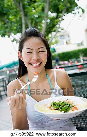 Stock Image - Thailand. Bangkok. Thai woman.. Fotosearch