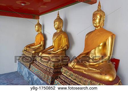 Stock Image - Thailand - Bangkok, Wat Phra Kaeo Temple, Grand Palace, Buddha statues. Fotosearch