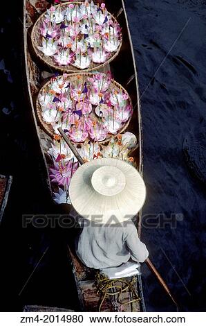 THAILAND, DAMNERN SADUAK, FLOATING MARKET ON CANAL, BOAT WITH KRATHONGS, FLOATING CANDLE OFFERS. View Large Photo Image Stock Image - THAILAND, DAMNERN SADUAK, FLOATING MARKET ON CANAL, BOAT WITH KRATHONGS, FLOATING CANDLE OFFERS.. Fotosearch