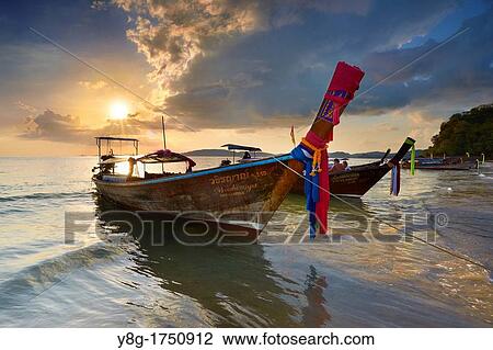 Stock Image - Thailand - Krabi province, Phang Nga Bay, sunset time on the beach. Fotosearch