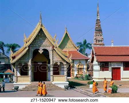 Thailand, Lamphun, Wat Phra That Haripunchai, monks View Large Photo Image Stock Photo - Thailand, Lamphun, Wat Phra That Haripunchai, monks. Fotosearch