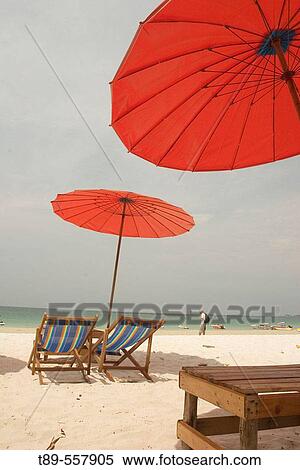 Stock Photography - Thailand, Rayong, Samed Island, Chairs on the beach. Fotosearch