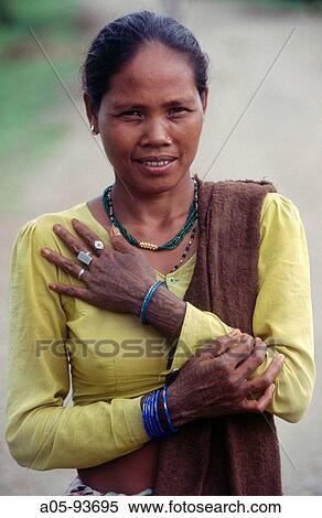 Stock Photography - Tharu woman with a tattoo. Royal Chitwan National Park. Nepal.. Fotosearch