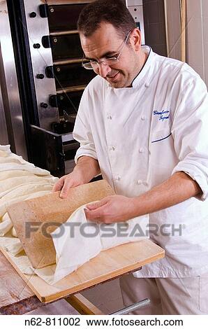 that envelops the baker of the bread dough to rise before it put it in the oven View Large Photo Image Stock Image - that envelops the baker of the bread dough to rise before it put it in the oven. Fotosearch
